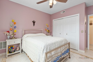 Step into this beautifully maintained, Tuscan-inspired residence