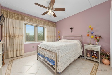 Step into this beautifully maintained, Tuscan-inspired residence