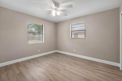 Welcome home to this updated 3-bedroom, 2-bath single-family - photo 12