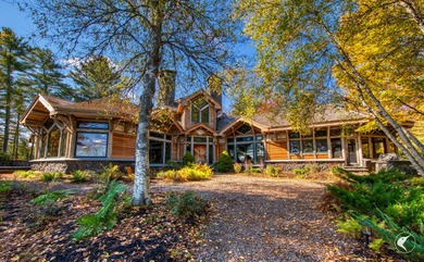 This extraordinary custom-built estate perched along the shores - photo 11