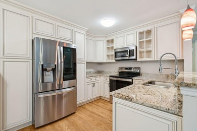 This first floor condo in a gated community with tons of - photo 12