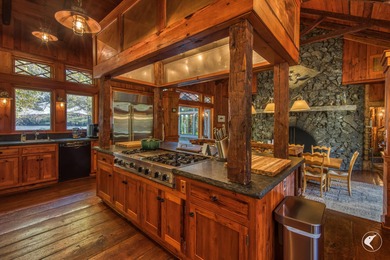 This extraordinary custom-built estate perched along the shores - photo 23