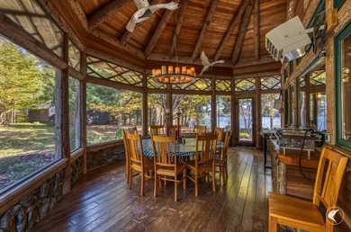 This extraordinary custom-built estate perched along the shores - photo 24