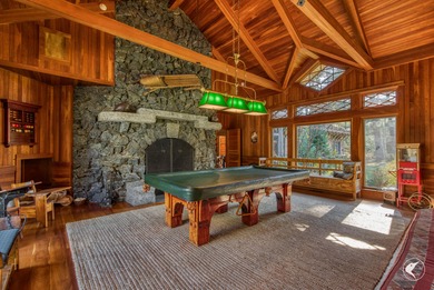 This extraordinary custom-built estate perched along the shores - photo 26