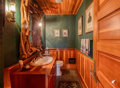 This extraordinary custom-built estate perched along the shores - photo 29