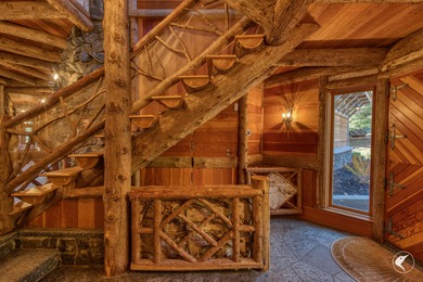 This extraordinary custom-built estate perched along the shores - photo 31