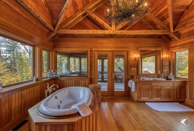 This extraordinary custom-built estate perched along the shores - photo 39