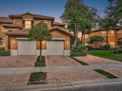 Nestled in the gated community of Heron Bay in Parkland, this - photo 1