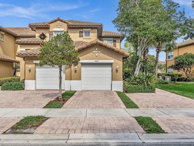 Nestled in the gated community of Heron Bay in Parkland, this - photo 2