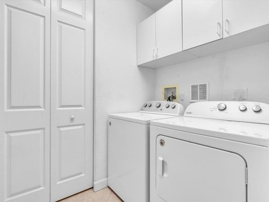 Nestled in the gated community of Heron Bay in Parkland, this - photo 5
