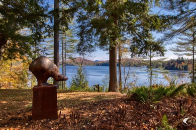 This extraordinary custom-built estate perched along the shores - photo 56