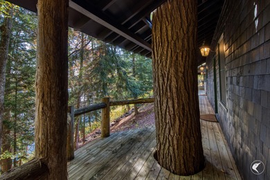 This extraordinary custom-built estate perched along the shores - photo 58
