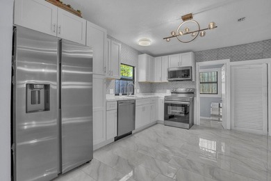 Fully updated 3BR/2BA home in historic North Palm Beach with 1 - photo 10
