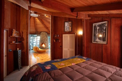 This oceanside sanctuary is set on a private forested promontory - photo 11