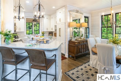 On the shores of Lake Glenville, Deer Run Cottage emerges as - photo 11