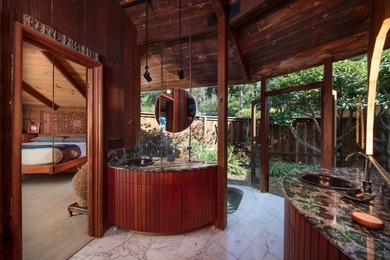 This oceanside sanctuary is set on a private forested promontory - photo 13