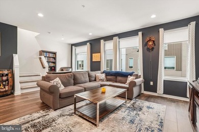 Experience modern riverfront living at its finest in one of - photo 13