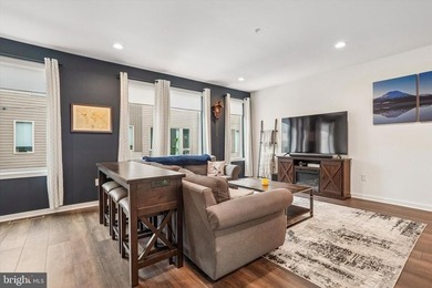 Experience modern riverfront living at its finest in one of - photo 14