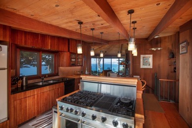 This oceanside sanctuary is set on a private forested promontory - photo 15