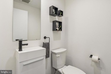 Experience modern riverfront living at its finest in one of - photo 15