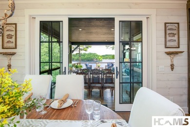 On the shores of Lake Glenville, Deer Run Cottage emerges as - photo 15