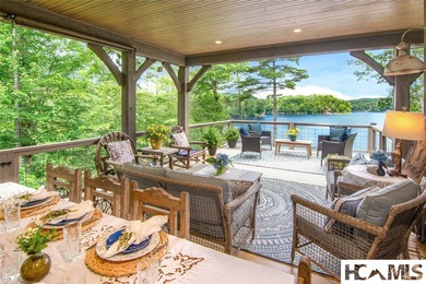 On the shores of Lake Glenville, Deer Run Cottage emerges as - photo 16