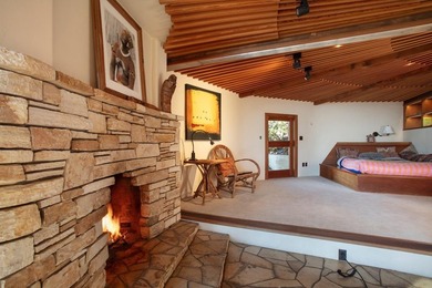 This oceanside sanctuary is set on a private forested promontory - photo 17