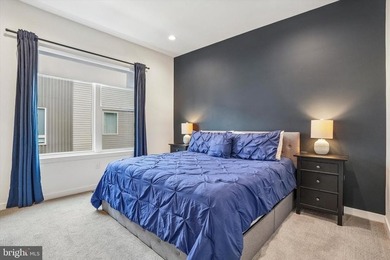 Experience modern riverfront living at its finest in one of - photo 17