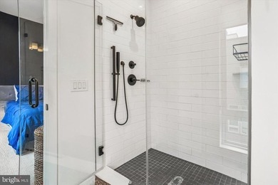 Experience modern riverfront living at its finest in one of - photo 20
