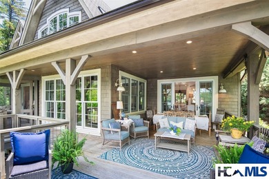 On the shores of Lake Glenville, Deer Run Cottage emerges as - photo 20