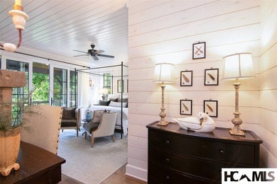 On the shores of Lake Glenville, Deer Run Cottage emerges as - photo 21