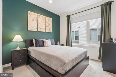 Experience modern riverfront living at its finest in one of - photo 22
