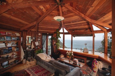 This oceanside sanctuary is set on a private forested promontory - photo 23
