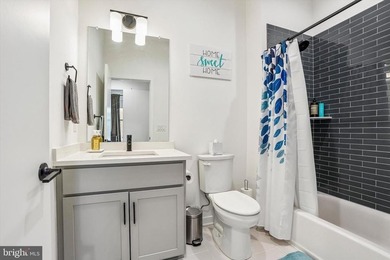 Experience modern riverfront living at its finest in one of - photo 23