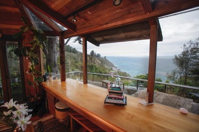 This oceanside sanctuary is set on a private forested promontory - photo 24