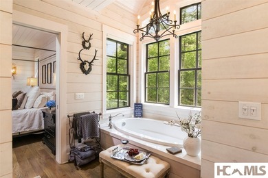 On the shores of Lake Glenville, Deer Run Cottage emerges as - photo 24