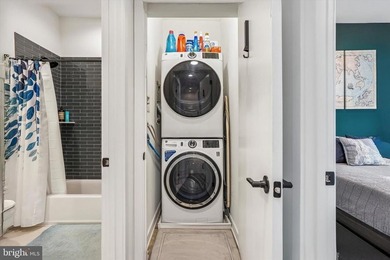 Experience modern riverfront living at its finest in one of - photo 25