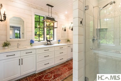 On the shores of Lake Glenville, Deer Run Cottage emerges as - photo 25