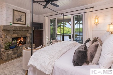 On the shores of Lake Glenville, Deer Run Cottage emerges as - photo 26