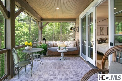 On the shores of Lake Glenville, Deer Run Cottage emerges as - photo 27