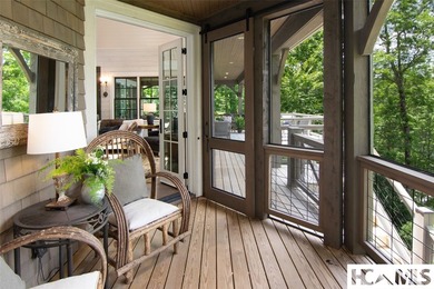 On the shores of Lake Glenville, Deer Run Cottage emerges as - photo 28