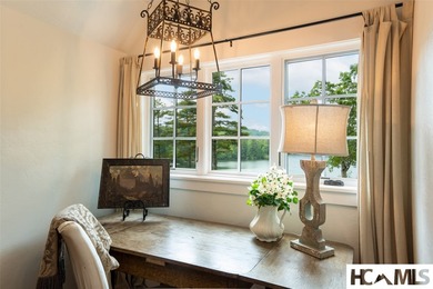 On the shores of Lake Glenville, Deer Run Cottage emerges as - photo 32