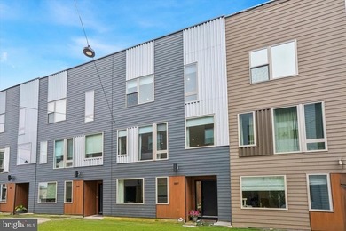 Experience modern riverfront living at its finest in one of - photo 35