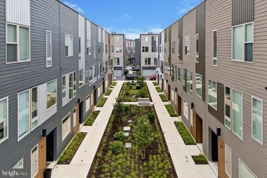 Experience modern riverfront living at its finest in one of - photo 36