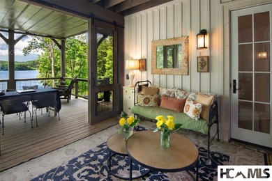 On the shores of Lake Glenville, Deer Run Cottage emerges as - photo 37