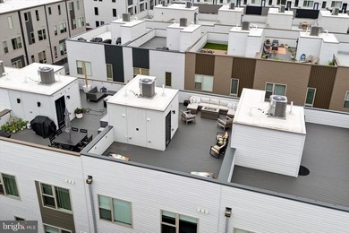 Experience modern riverfront living at its finest in one of - photo 39