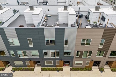 Experience modern riverfront living at its finest in one of - photo 40