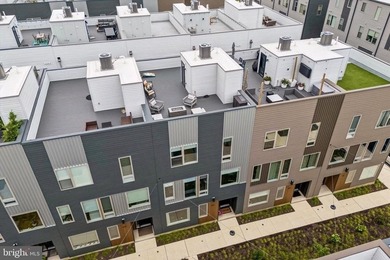 Experience modern riverfront living at its finest in one of - photo 41