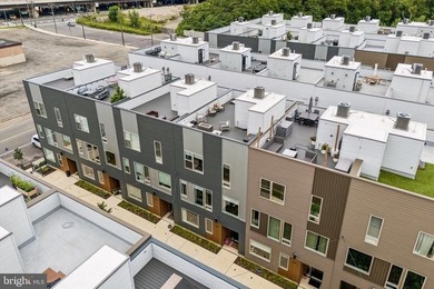Experience modern riverfront living at its finest in one of - photo 42