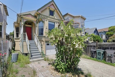 Classic 1897 Victorian in the Heart of West Oakland! Filled with - photo 2